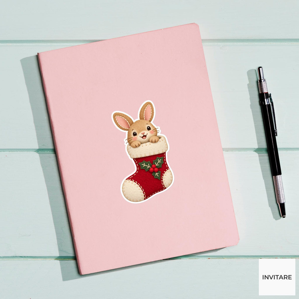 Rabbit poking its ears and smiling face out of a red Christmas stocking cuff Vinyl Sticker