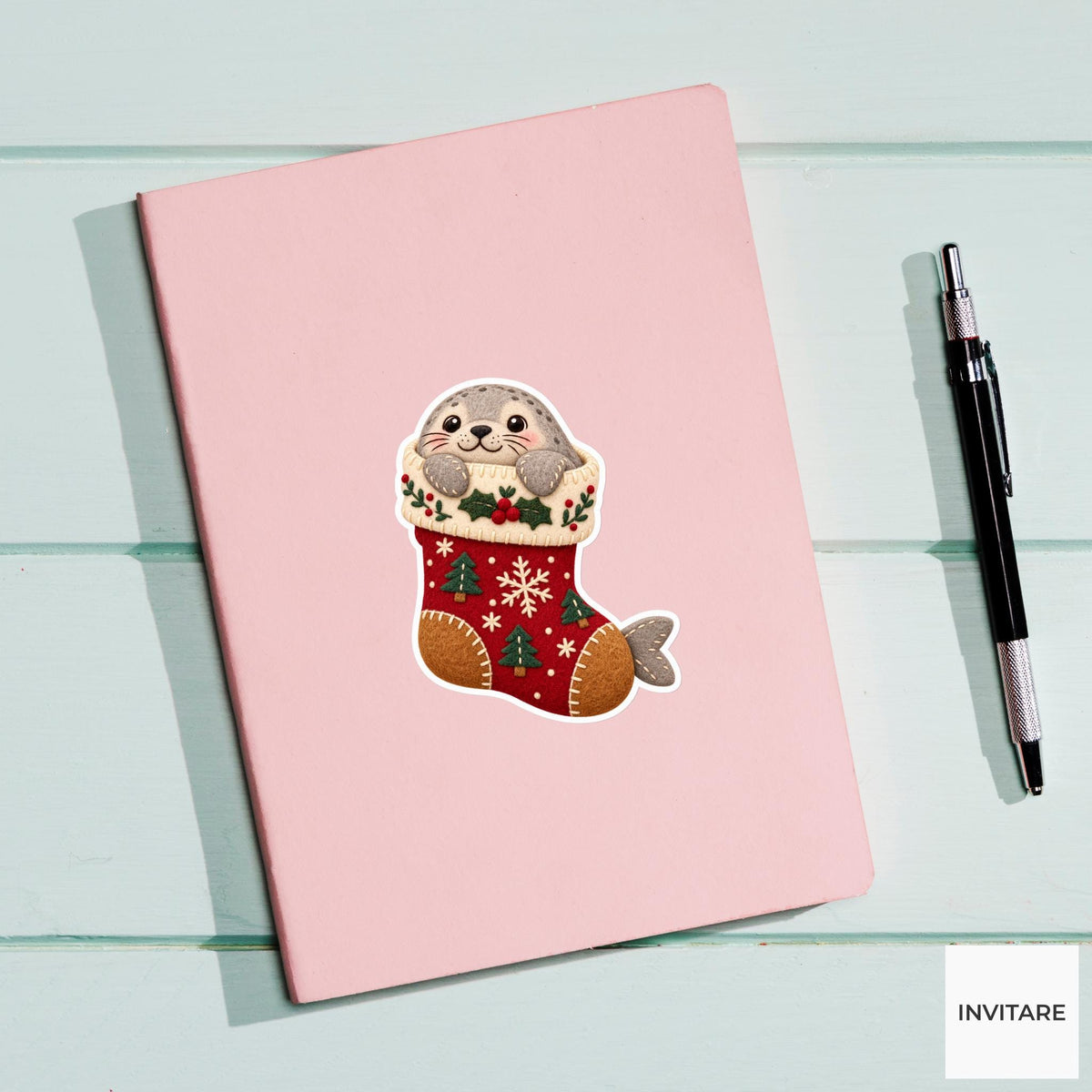 Seal wedging its round body into the stocking toe with its nose peeking through the cuff Vinyl Sticker