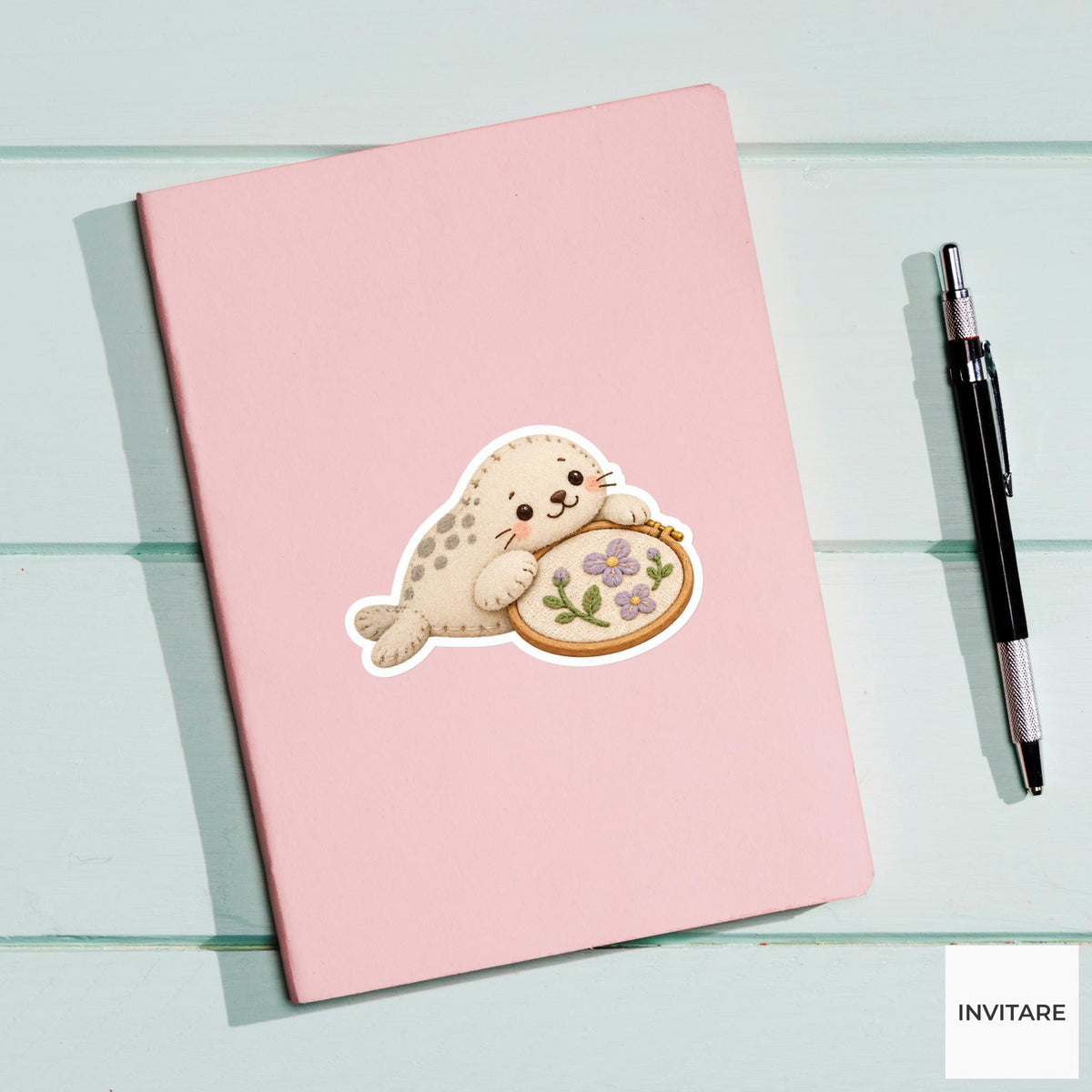 Seal resting its head on a soft embroidery hoop Vinyl Sticker