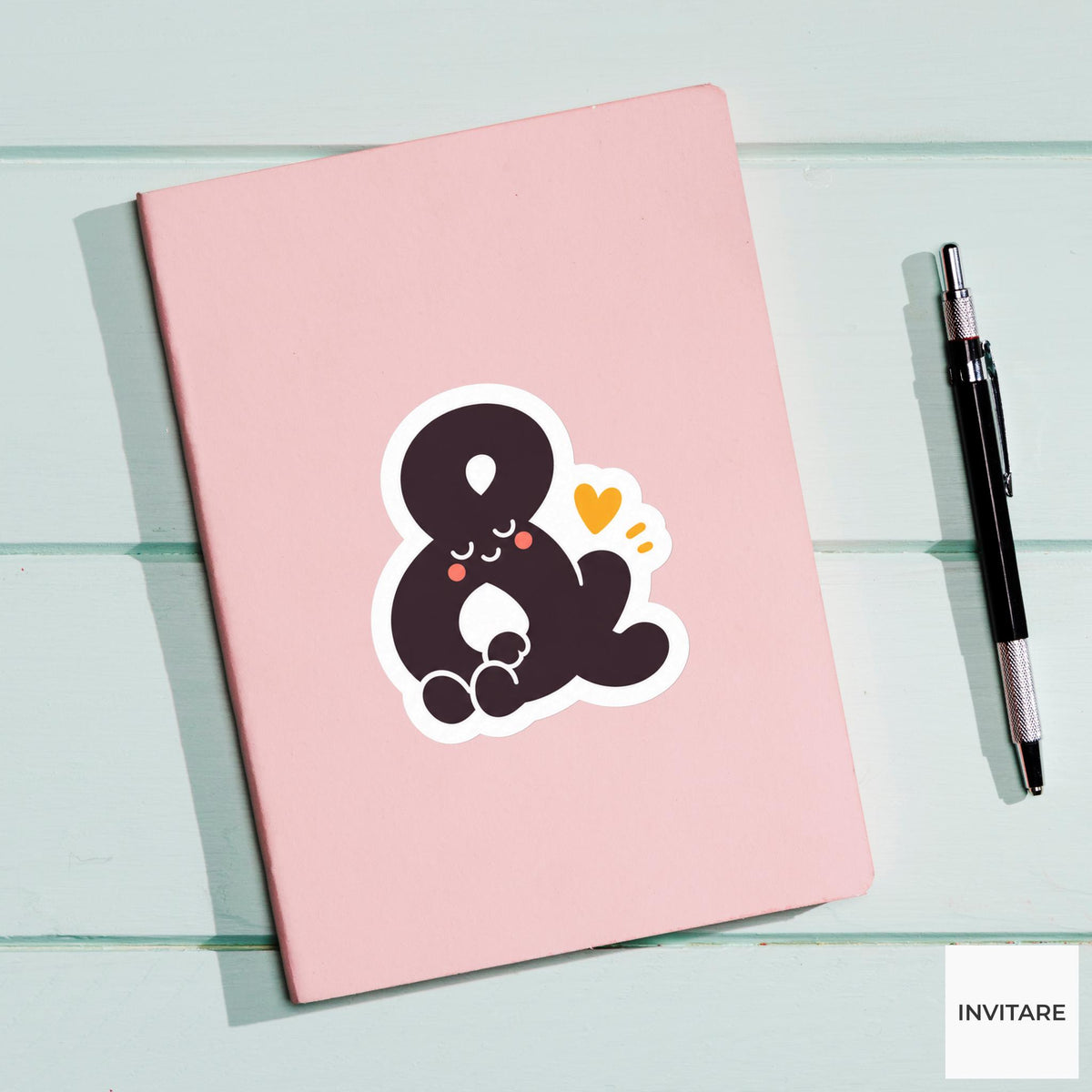 ampersand sitting with its loops folded comfortably Vinyl Sticker