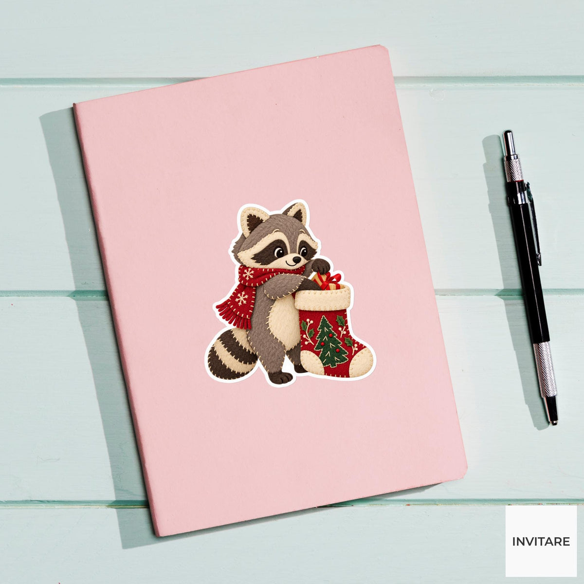 Raccoon reaching deep into the stocking to fish out a small gift ribbon Vinyl Sticker