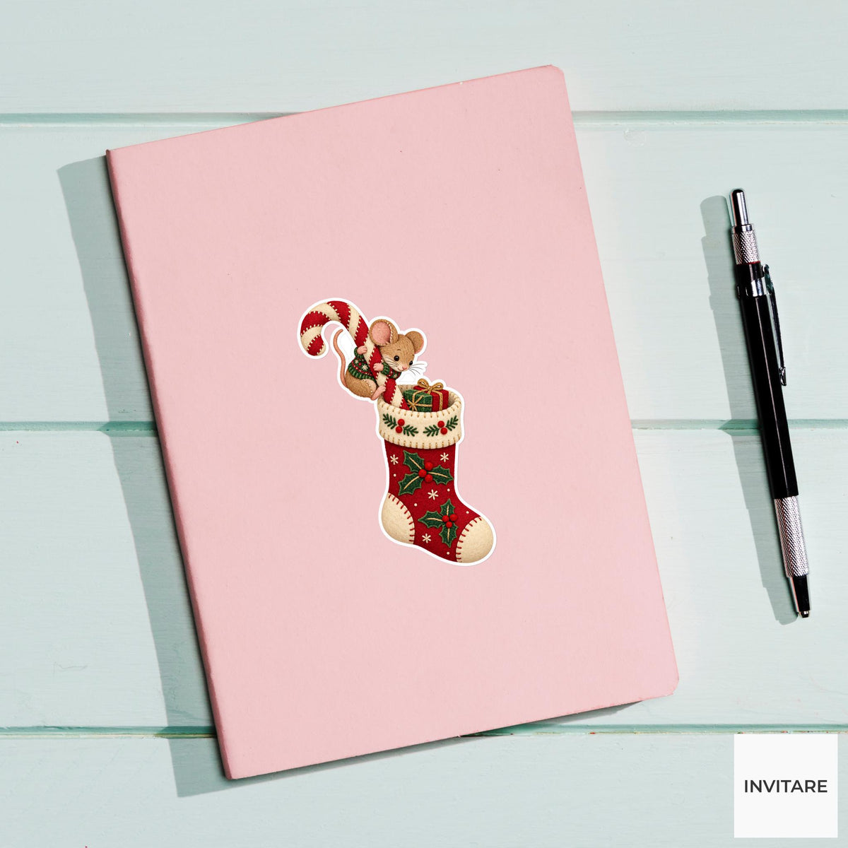 Mouse climbing down a candy cane into a tall Christmas stocking Vinyl Sticker