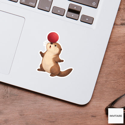 Otter balancing a soft ball on its broad nose Vinyl Sticker