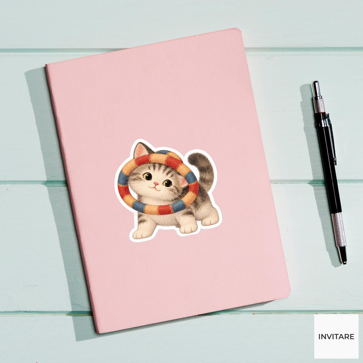 Cat peeking through a hoop tangled around its ears Vinyl Sticker