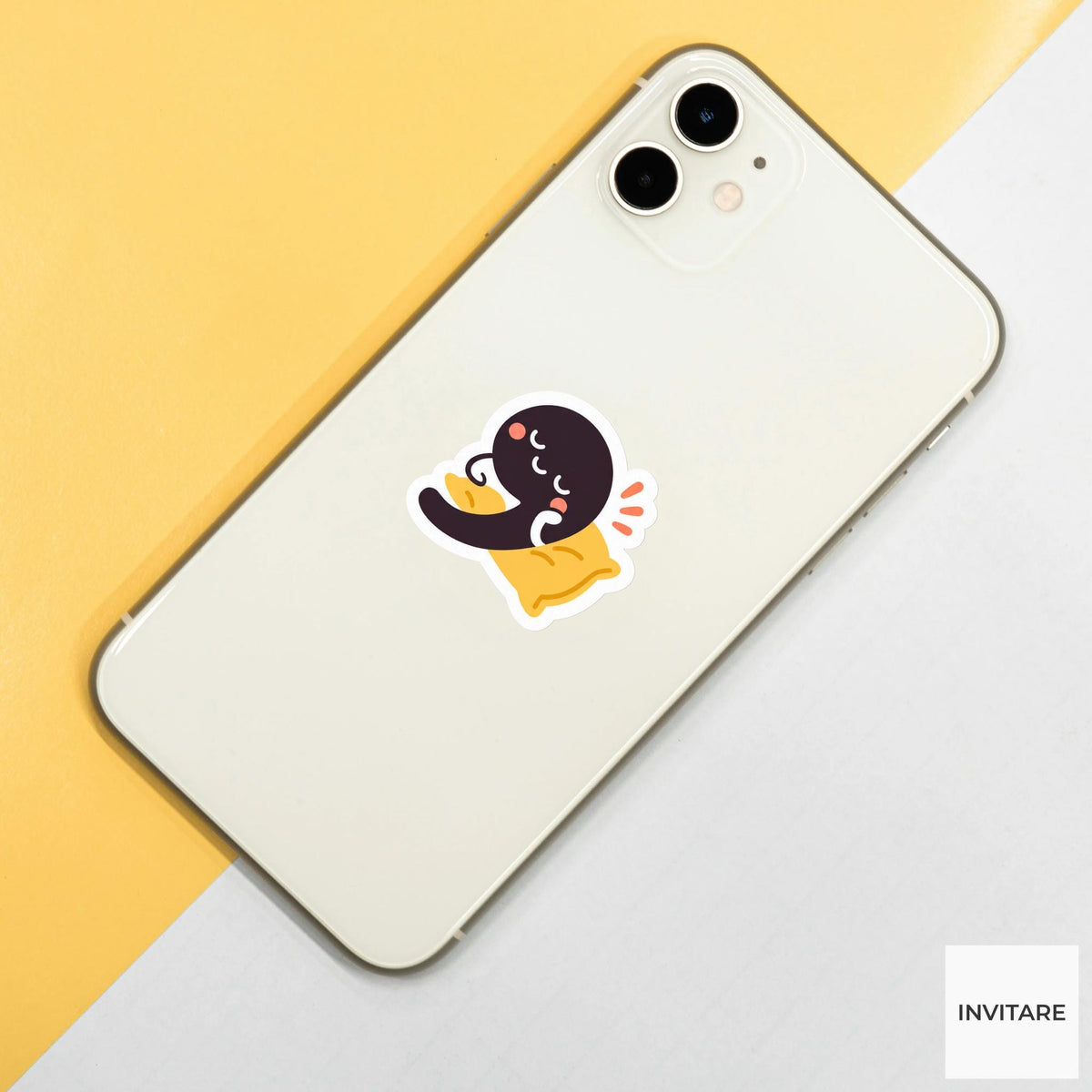 comma leaning on a tiny cushion Vinyl Sticker