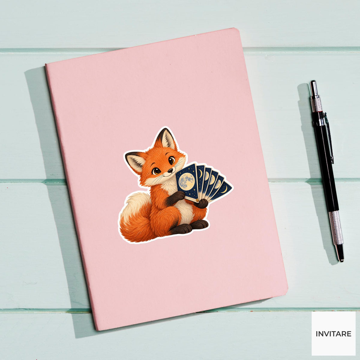 Fox holding a moon-phase flipbook with one page open like a fan Vinyl Sticker