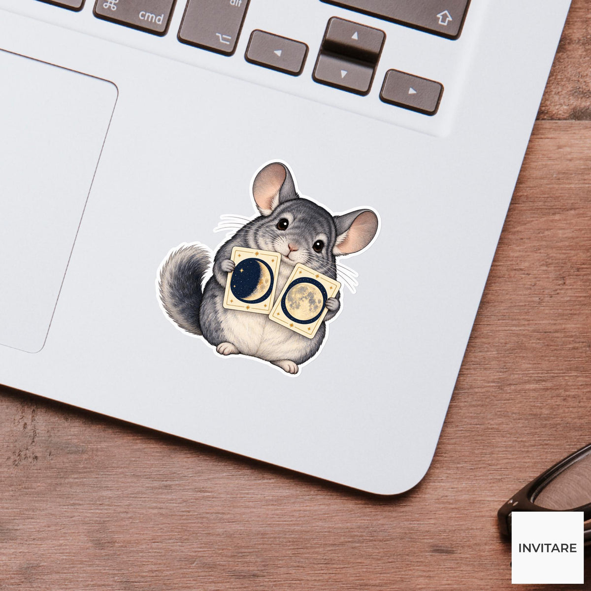 Chinchilla comparing two illustrated moon phases on cream cards held side by side Vinyl Sticker