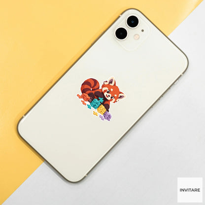 Red panda stacking sorted edge pieces in neat piles beside its ringed tail Vinyl Sticker