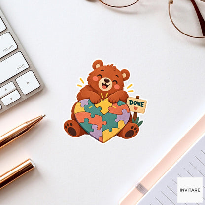 Bear celebrating as both paws press the last piece into a heart-shaped puzzle Vinyl Sticker
