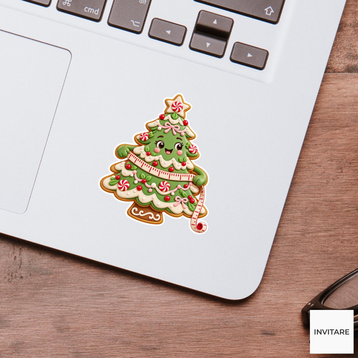 Tree cookie adjusting an icing measuring tape around its broad lower branches Vinyl Sticker