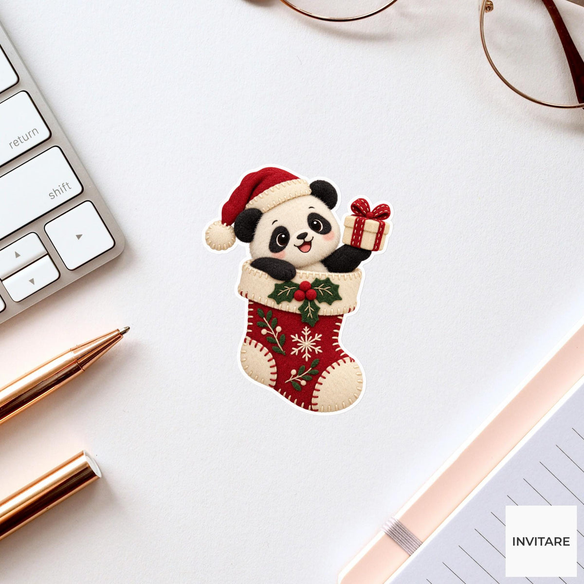 Panda popping out of a stocking and presenting a tiny cream gift box Vinyl Sticker