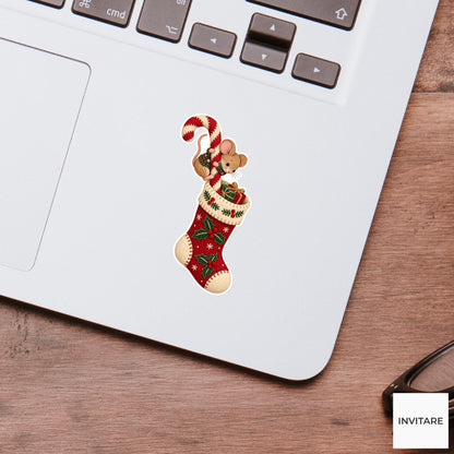 Mouse climbing down a candy cane into a tall Christmas stocking Vinyl Sticker
