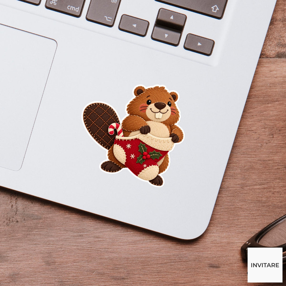 Beaver pulling a stocking up around its belly while a candy peeks beside its broad tail Vinyl Sticker