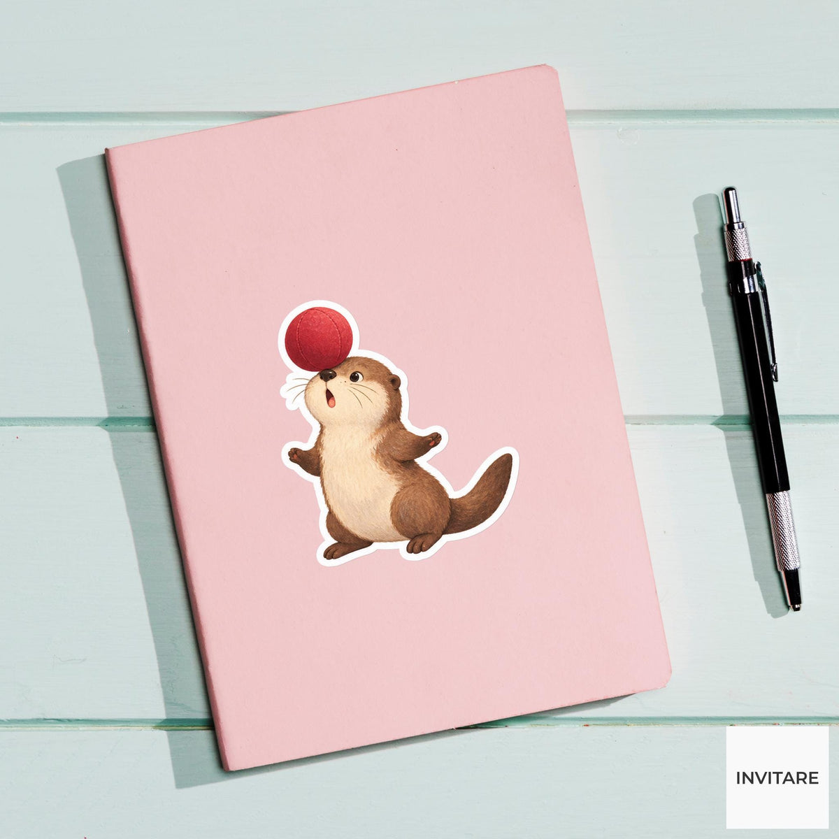 Otter balancing a soft ball on its broad nose Vinyl Sticker