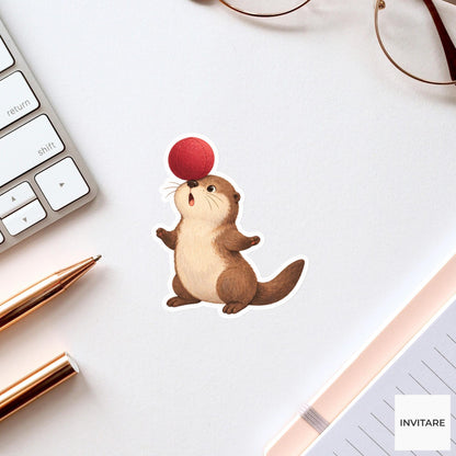 Otter balancing a soft ball on its broad nose Vinyl Sticker