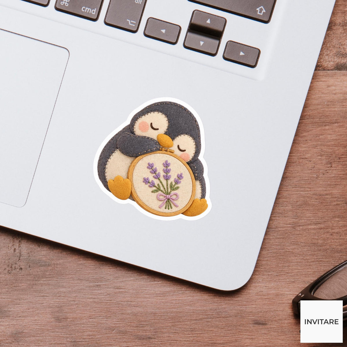 Penguin dozing with its beak resting on a fabric hoop Vinyl Sticker