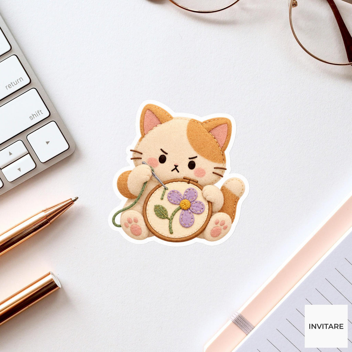 Cat stitching a crooked flower with a very serious face Vinyl Sticker