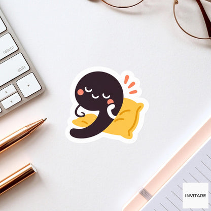 comma leaning on a tiny cushion Vinyl Sticker