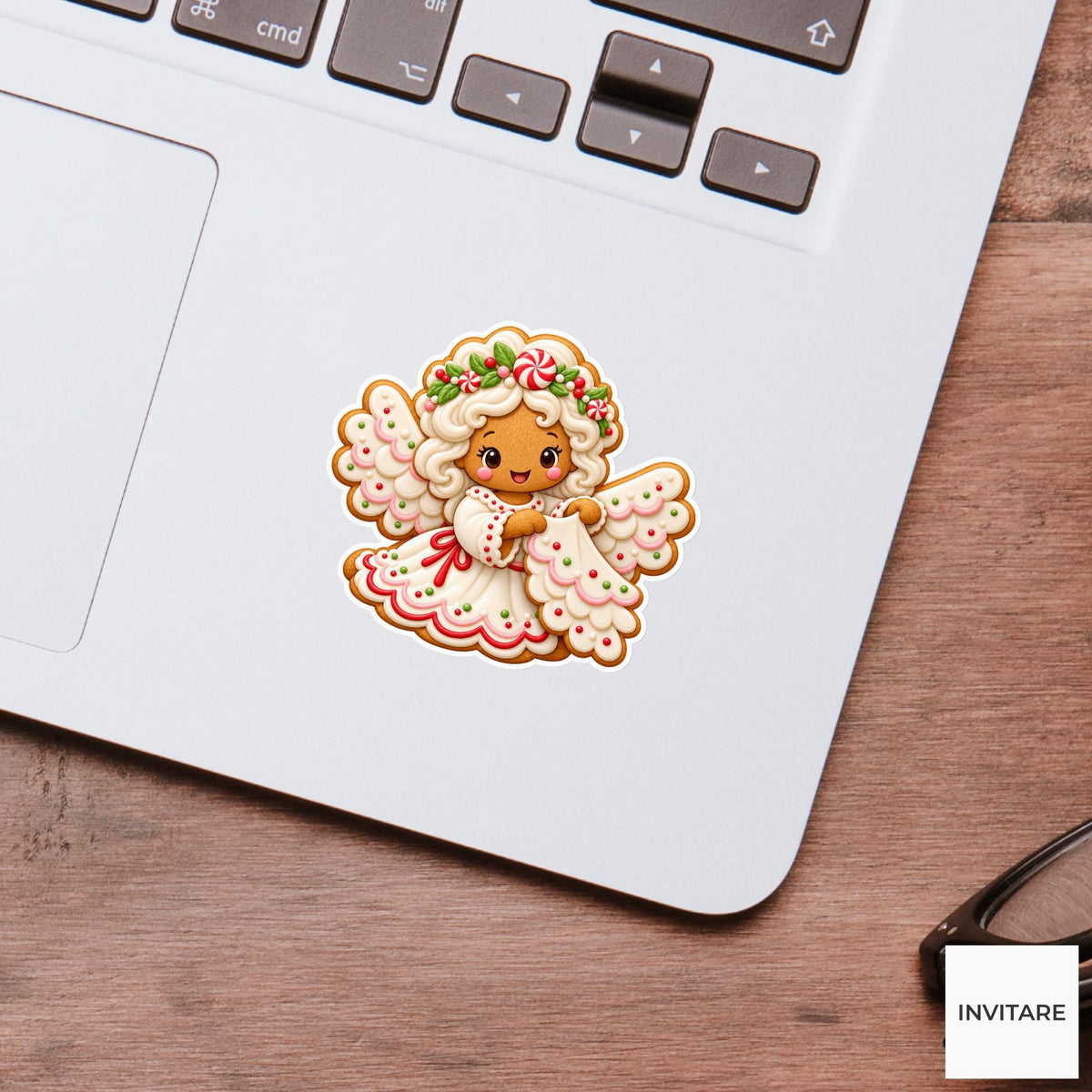Angel cookie arranging scalloped frosting sleeves like soft little wings Vinyl Sticker