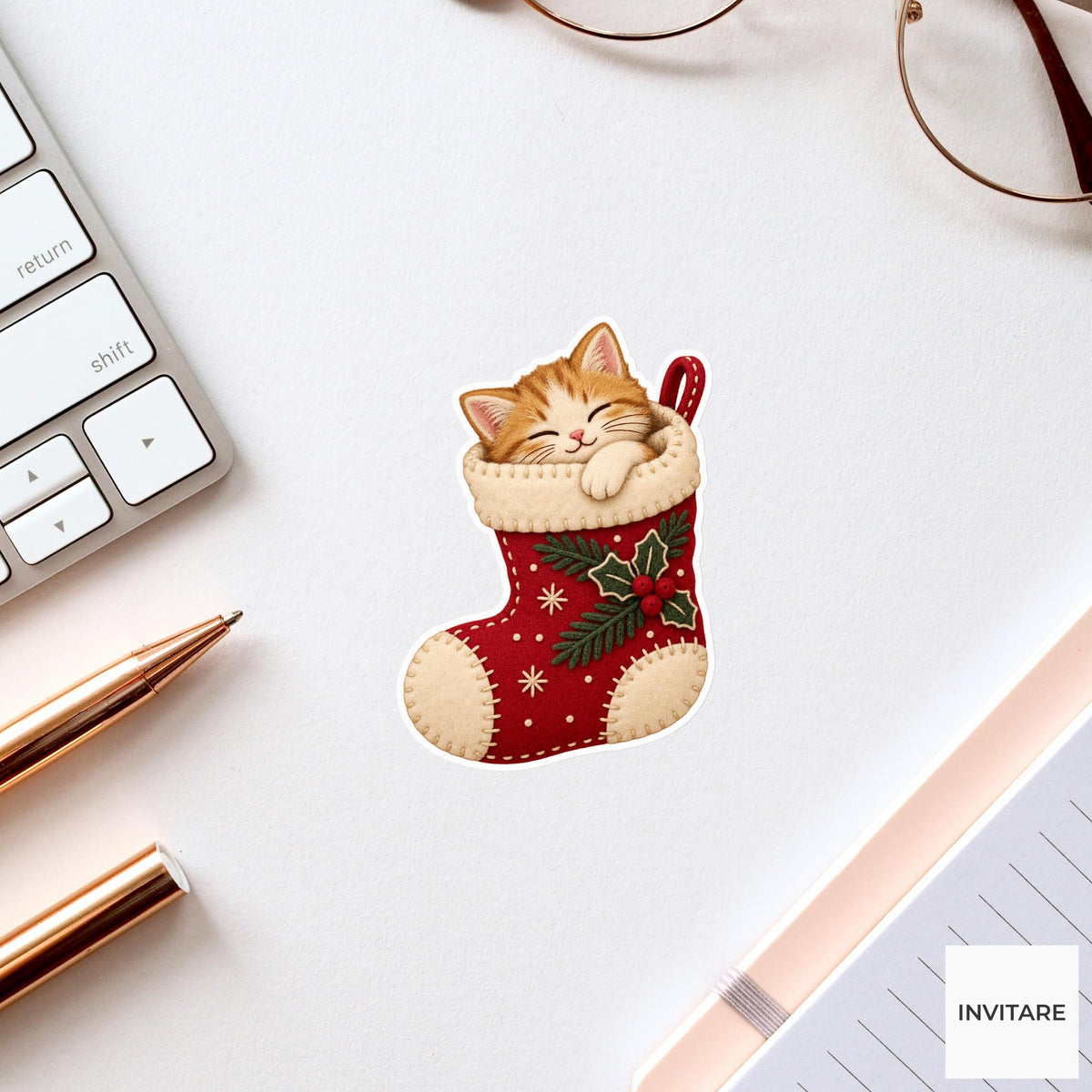 Cat sleeping inside a curved stocking with one paw draped over its edge Vinyl Sticker