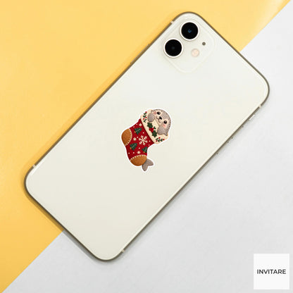 Seal wedging its round body into the stocking toe with its nose peeking through the cuff Vinyl Sticker